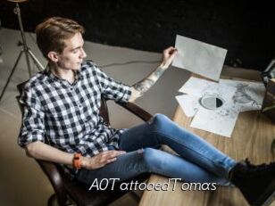 A0TattooedTomas